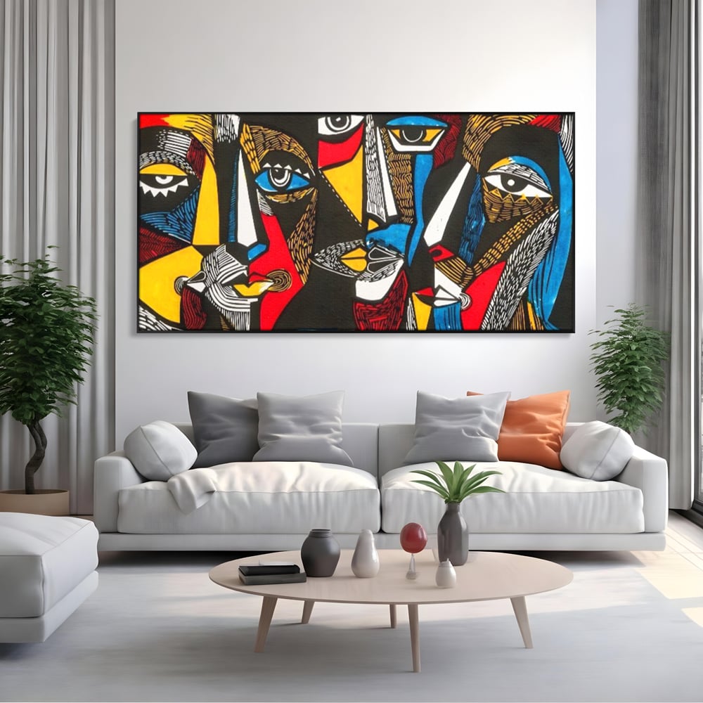 Tablou canvas cu tablou abstract cu fete colorate, in rama de aluminiu negru, pe perete intr-un living